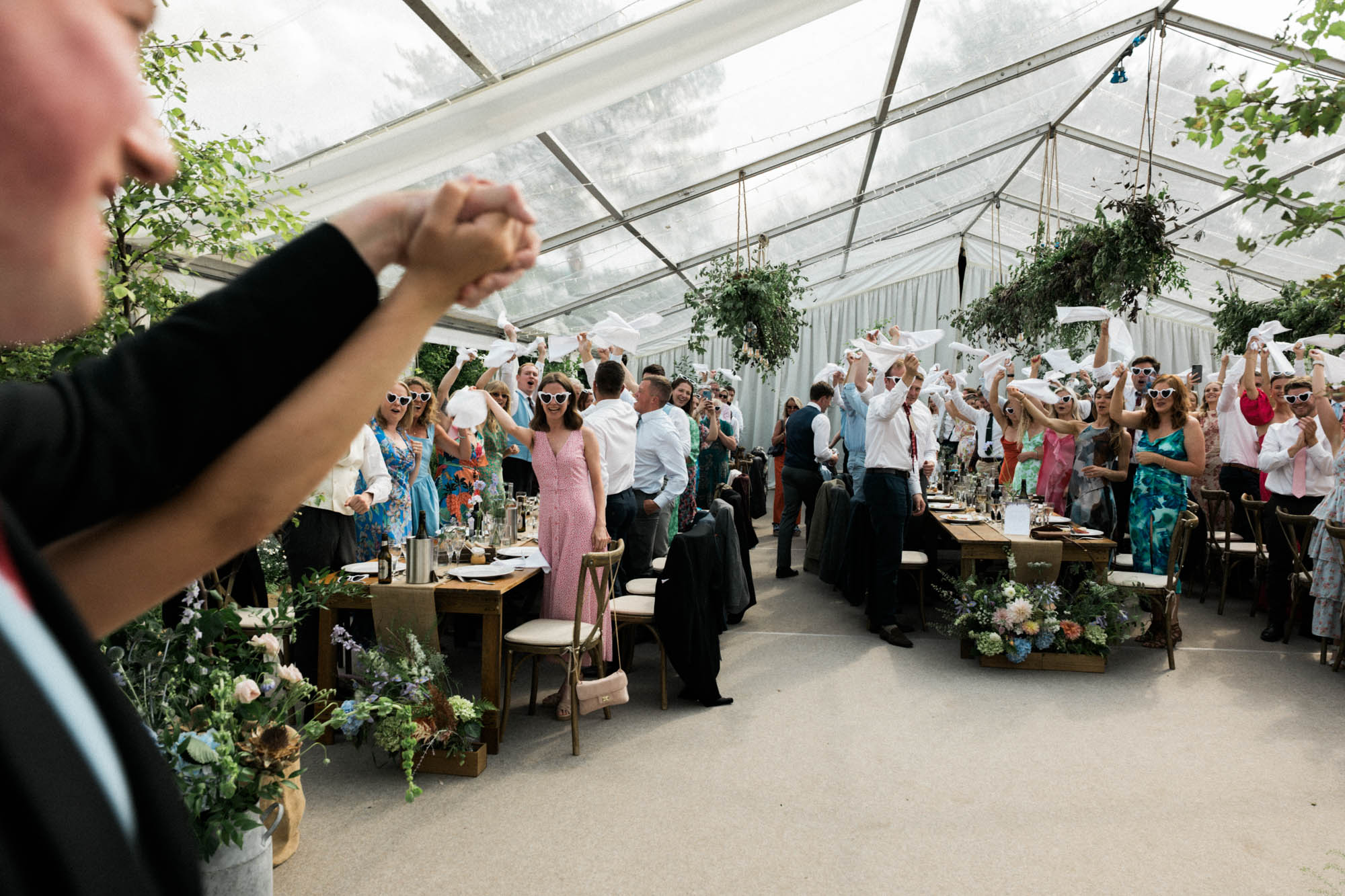 Hamswell house bride and groom enter the marquee 